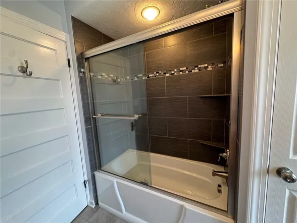 a bathroom with a bathtub