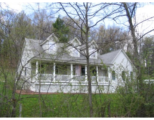 34 Shattuck Street Groton, MA 01450 - Photo 1 of 10 a view of a house with a yard