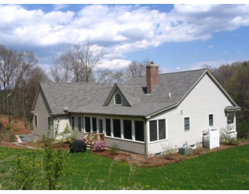34 Shattuck Street Groton, MA 01450 - Photo 2 of 10 a front view of house with yard