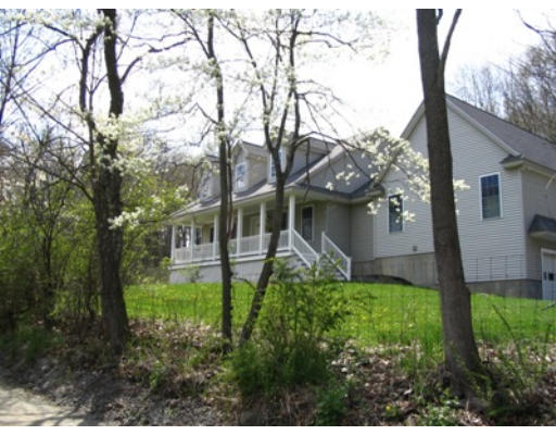 34 Shattuck Street Groton, MA 01450 - Photo 4 of 10 a view of backyard of house with green space