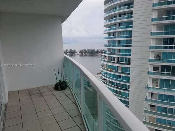 a view of a balcony with an outdoor space