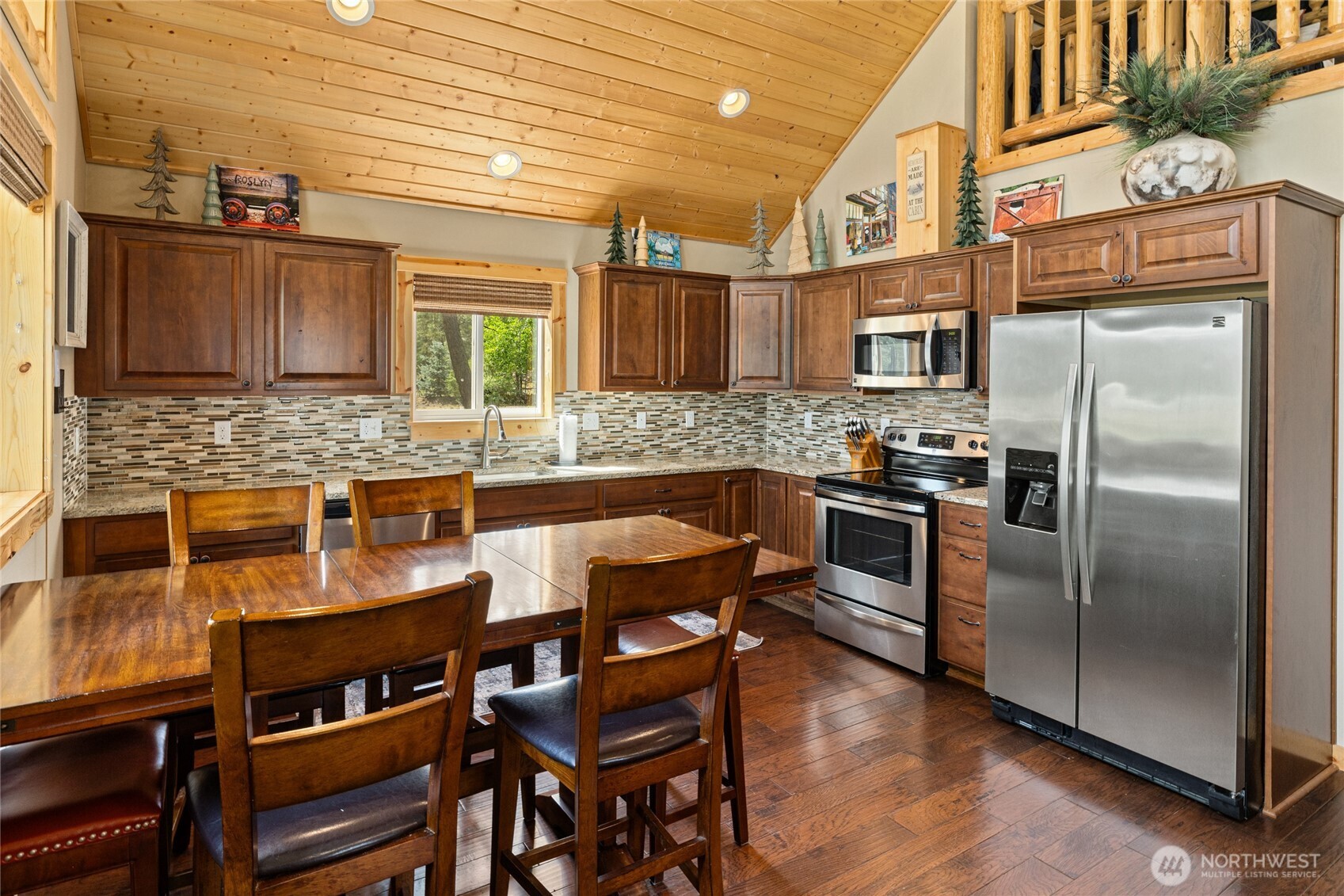910 Bakers Road Ronald, WA 98940 - Photo 18 of 34 a kitchen with kitchen island a counter top space a sink stainless steel appliances and cabinets