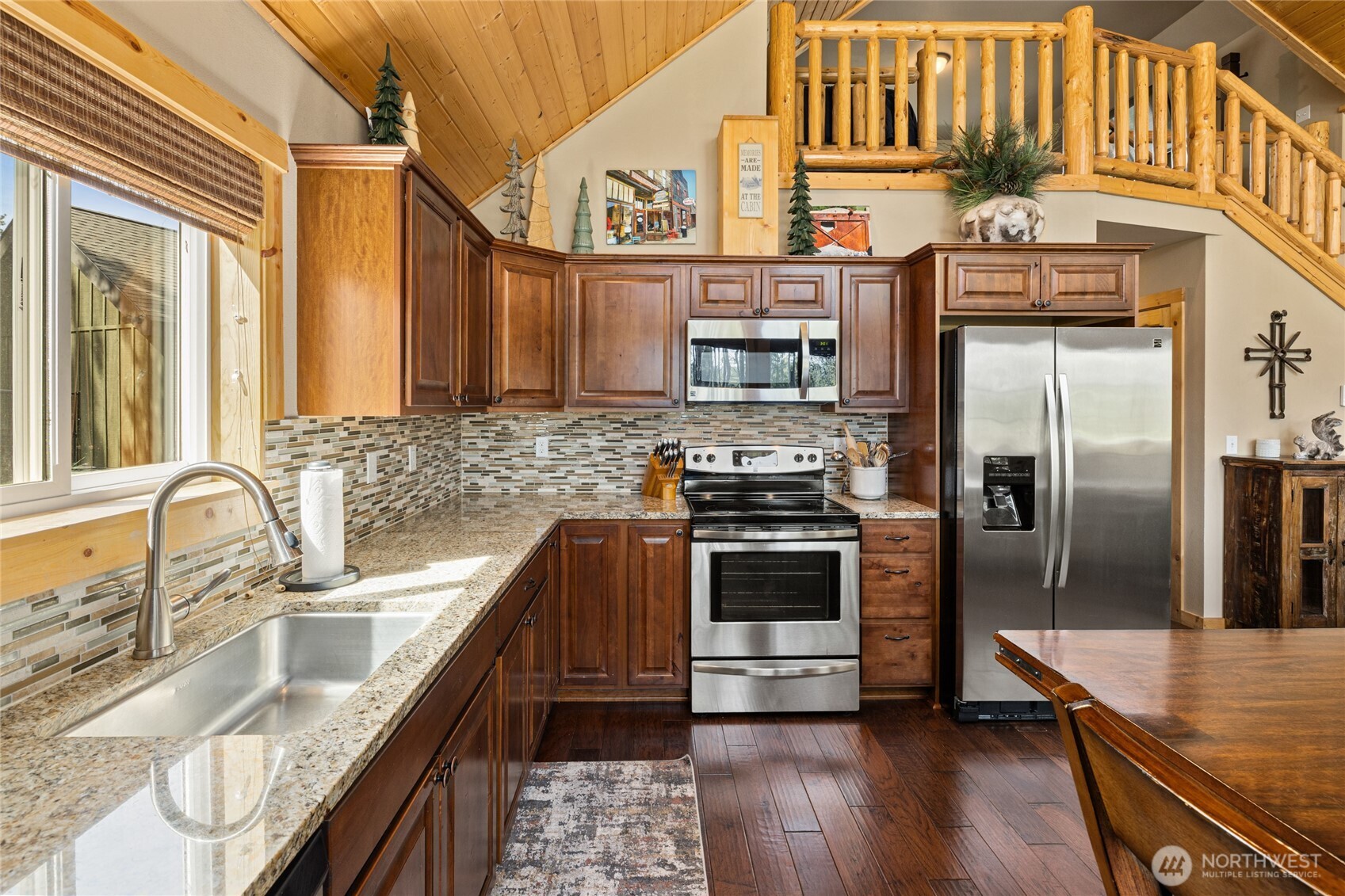 910 Bakers Road Ronald, WA 98940 - Photo 19 of 34 a kitchen with stainless steel appliances granite countertop a sink a stove and a refrigerator