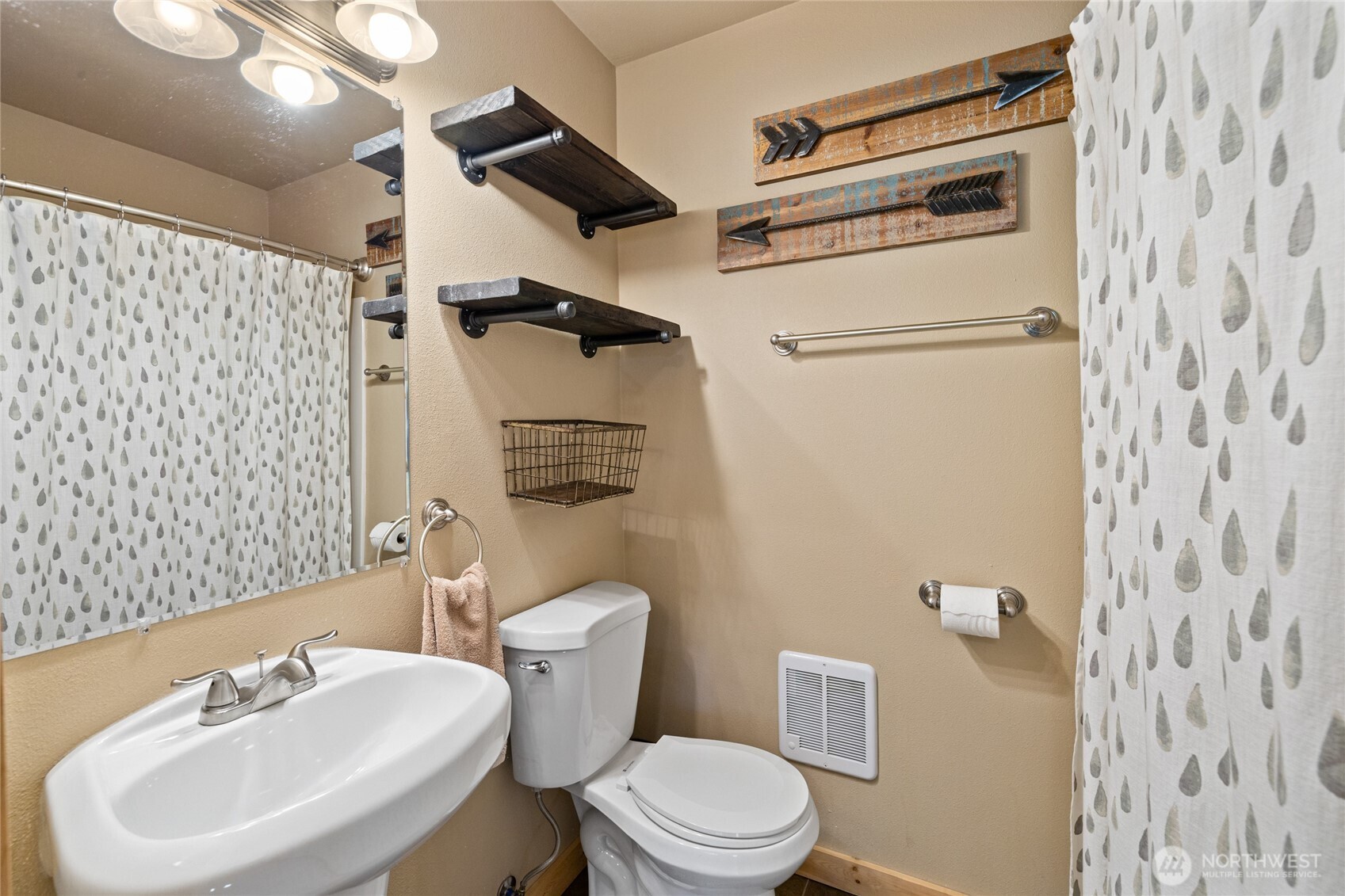 910 Bakers Road Ronald, WA 98940 - Photo 31 of 34 a white toilet sitting next to a bathroom sink