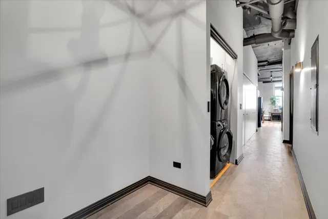 a view of a hallway with a white door