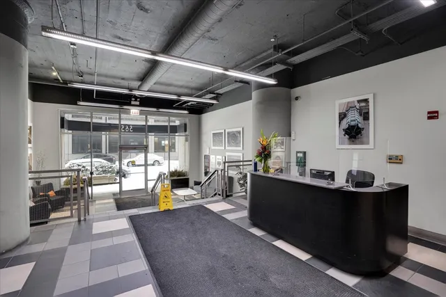 a view of kitchen with cabinets