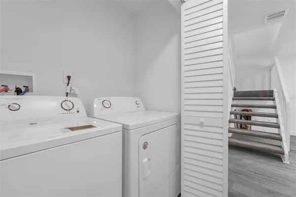 a view of a hallway with closet area