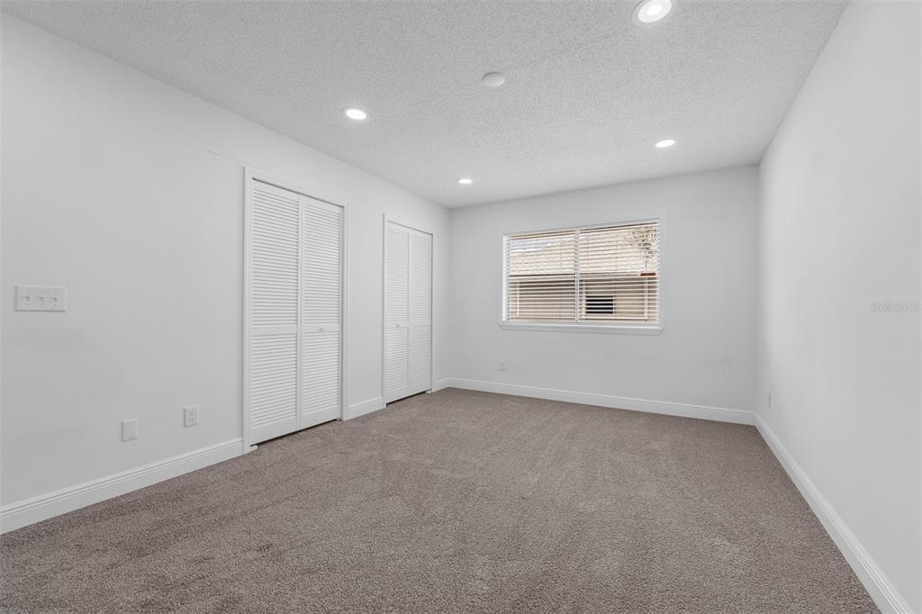 4402 Ring Neck Road, Unit 19B Orlando, FL 32808 - Photo 21 of 35 a view of an empty room with a window