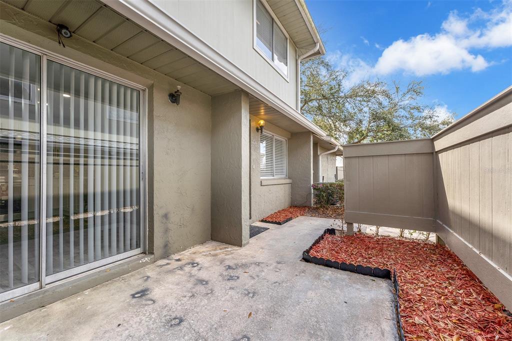 4402 Ring Neck Road, Unit 19B Orlando, FL 32808 - Photo 26 of 35 a front view of a house