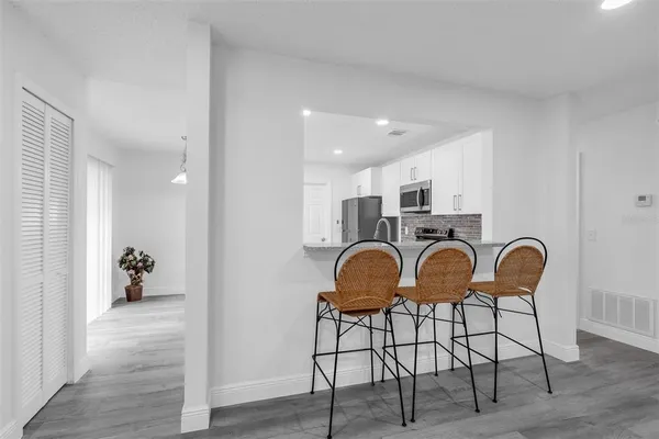 a view of entryway and workspace