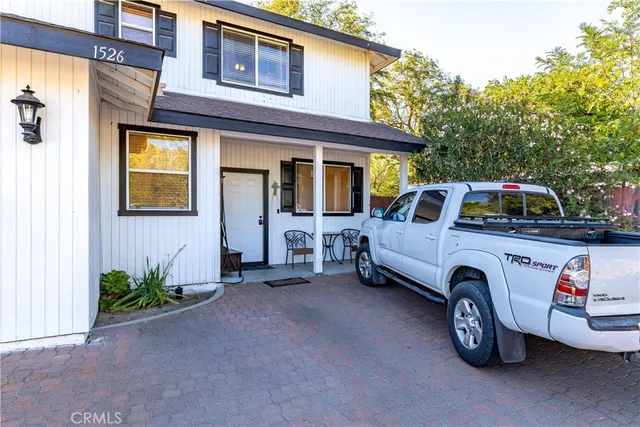 a view of a car park in front of a building