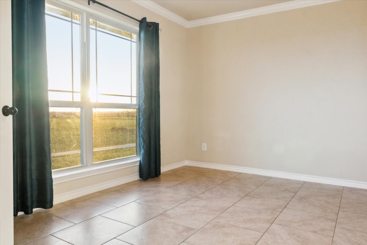 2407 Thuesen Road Beasley, TX 77417 - Photo 12 of 34 a view of an empty room and window