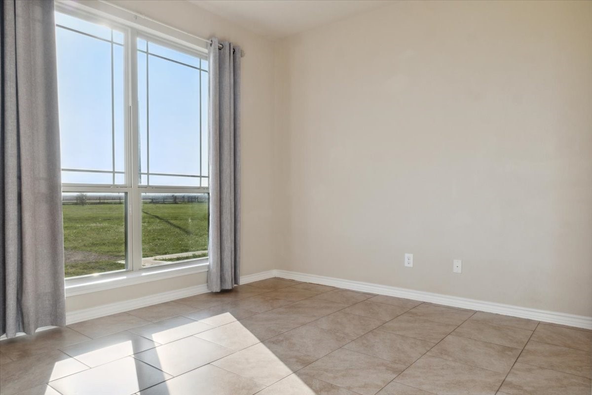 2407 Thuesen Road Beasley, TX 77417 - Photo 26 of 34 a view of an empty room and window