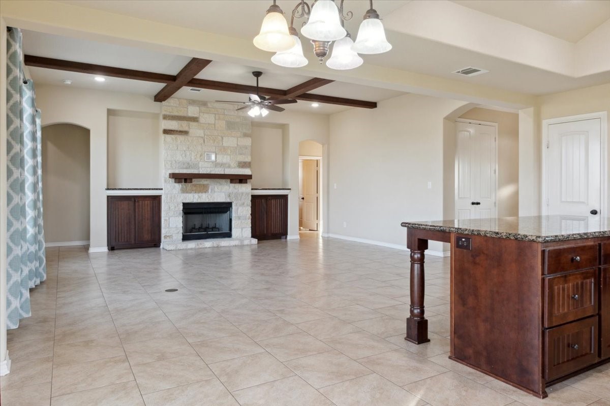 2407 Thuesen Road Beasley, TX 77417 - Photo 9 of 34 a view of a kitchen with a sink and a refrigerator