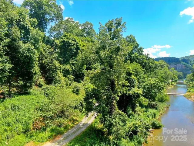 a view of a garden with a building