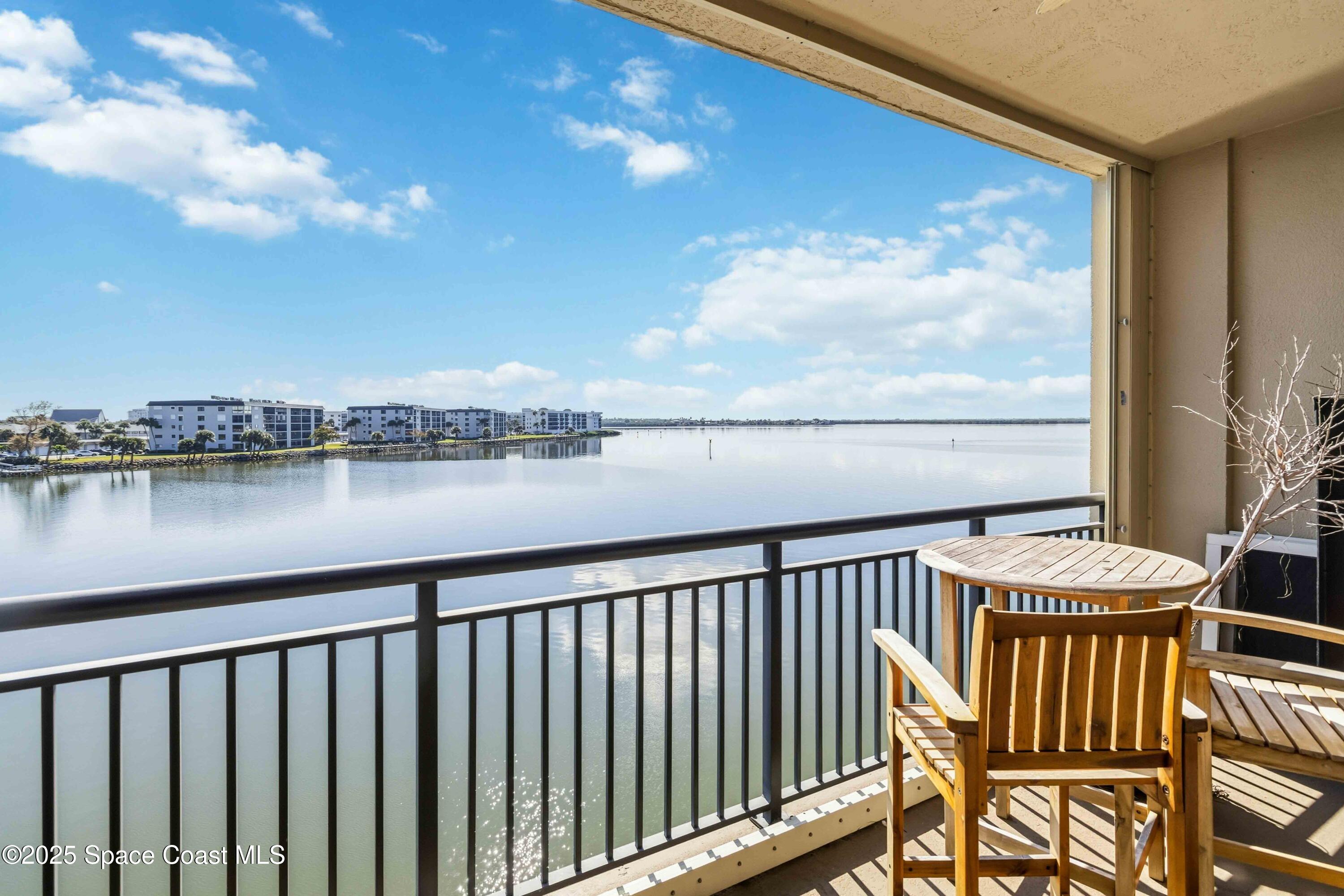 4125 West End Road, Unit 306 Cocoa Beach, FL 32931 - Photo 24 of 51 a view of city from a balcony