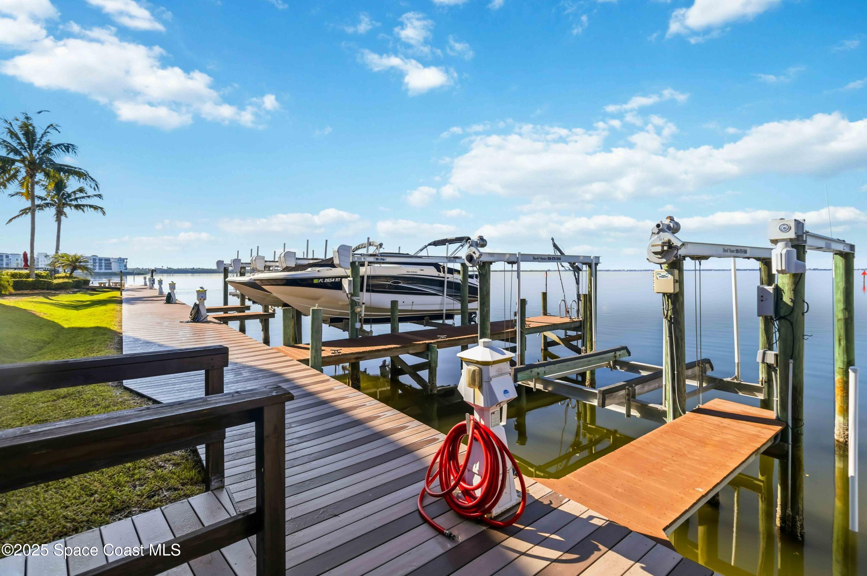 4125 West End Road, Unit 306 Cocoa Beach, FL 32931 - Photo 26 of 51 a view of a balcony with chairs