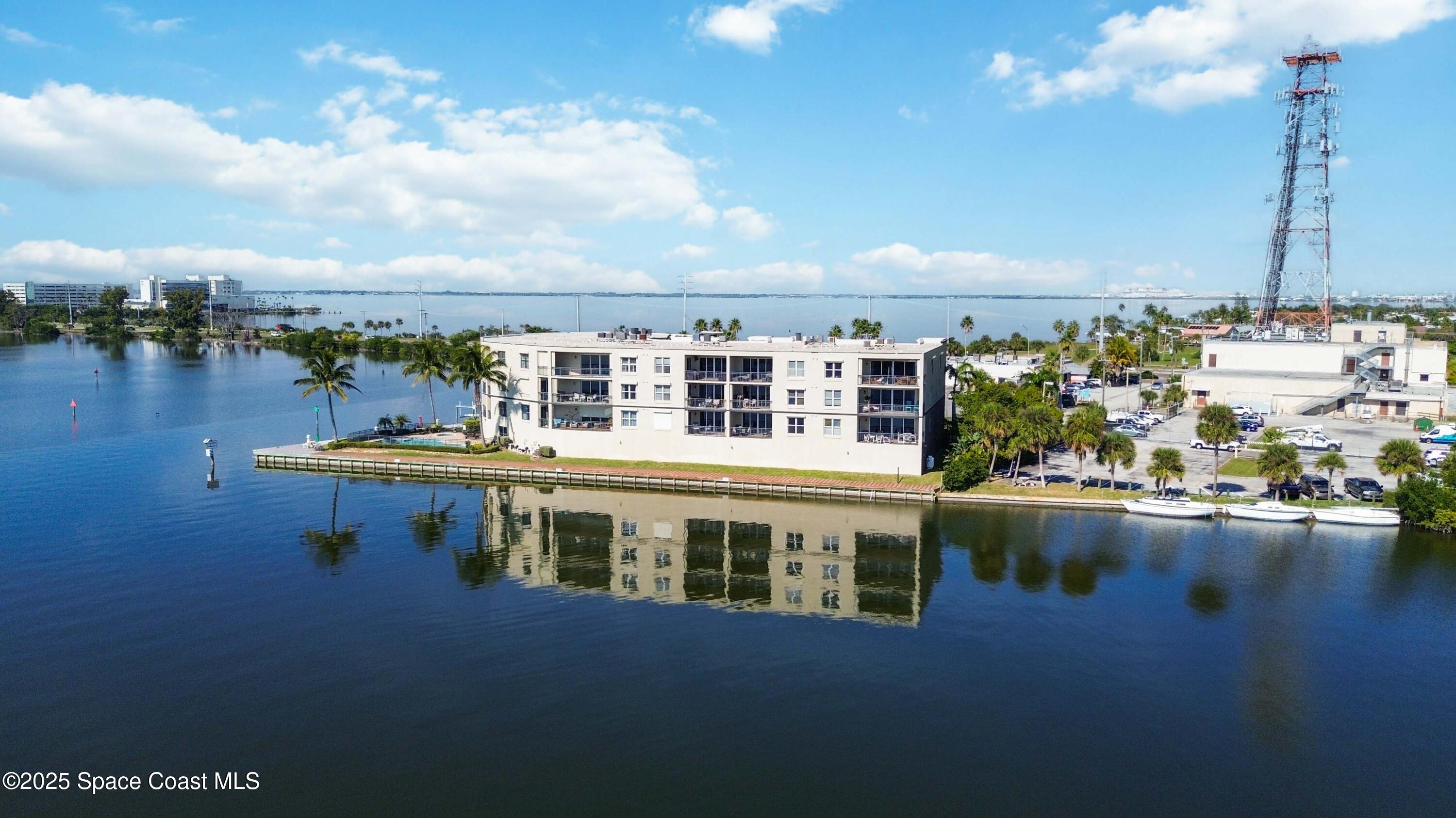4125 West End Road, Unit 306 Cocoa Beach, FL 32931 - Photo 31 of 51 a view of a ocean with building