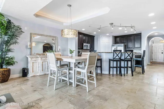 a view of a dining room kitchen and a window