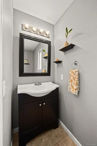 a bathroom with a toilet and a window