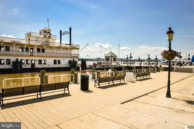 a view of a building with sitting area