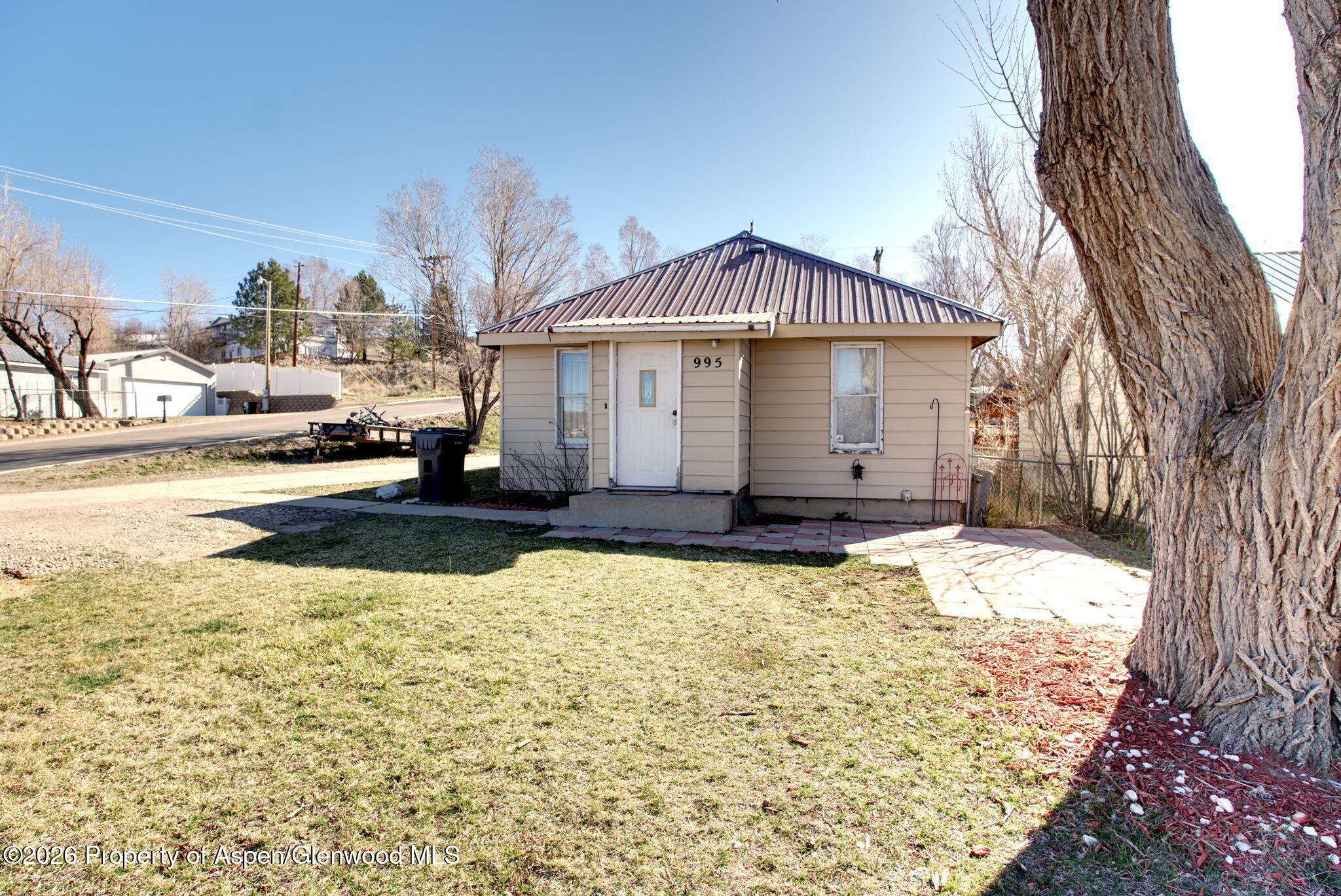995 Colorado Street Craig, CO 81625 - Photo 3 of 21 a view of a house with snow on the ground