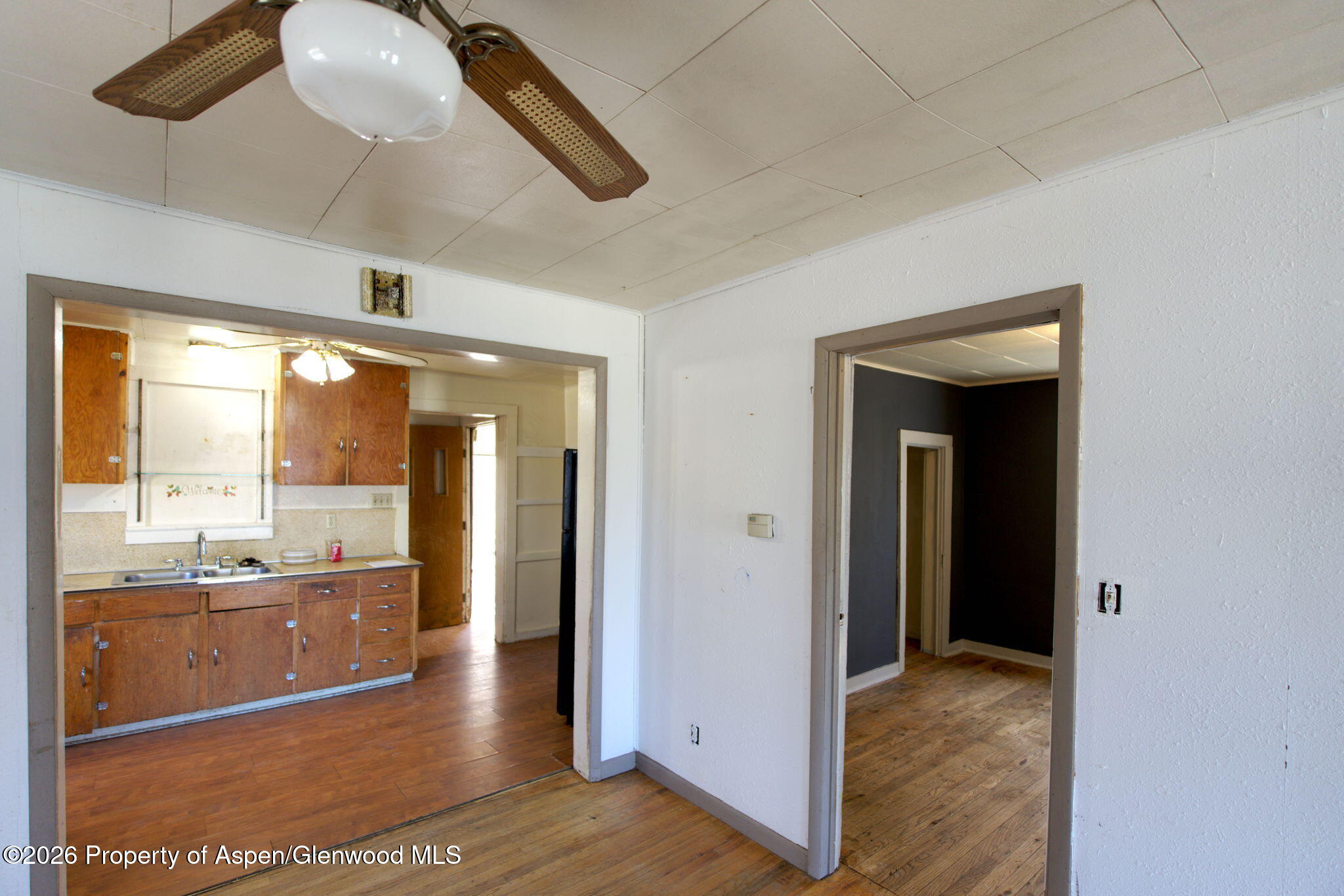 995 Colorado Street Craig, CO 81625 - Photo 8 of 21 a view of a kitchen and a window