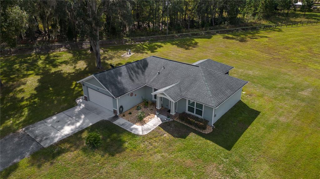 6140 Northwest 145th Avenue Road Morriston, FL 32668 - Photo 44 of 75 a view of a house with a ocean view