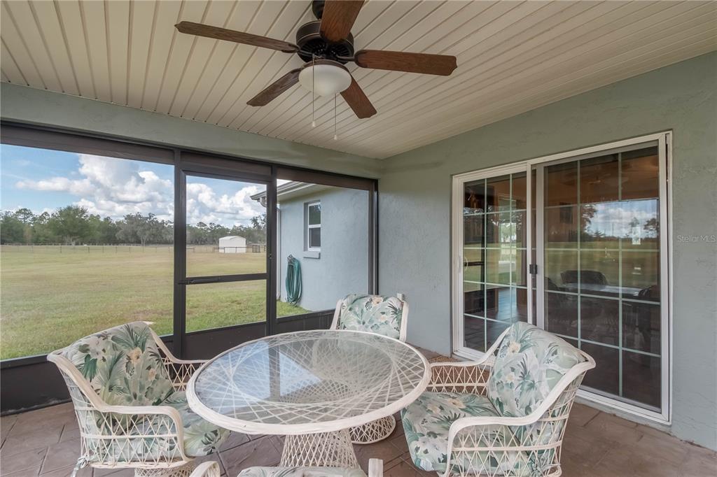 6140 Northwest 145th Avenue Road Morriston, FL 32668 - Photo 49 of 75 a dining room with furniture window and outside view