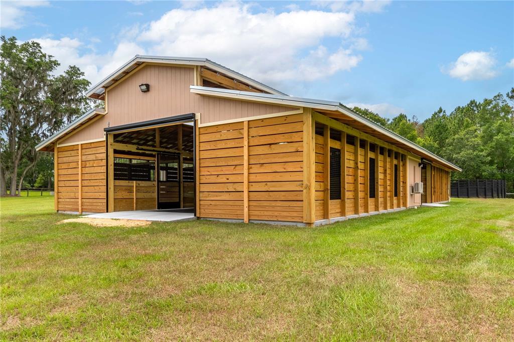 6140 Northwest 145th Avenue Road Morriston, FL 32668 - Photo 56 of 75 a front view of a house with a yard