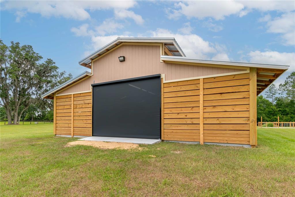 6140 Northwest 145th Avenue Road Morriston, FL 32668 - Photo 60 of 75 a front view of house with an outdoor space