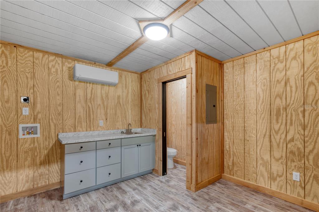 6140 Northwest 145th Avenue Road Morriston, FL 32668 - Photo 66 of 75 a bathroom with a double vanity sink and a mirror