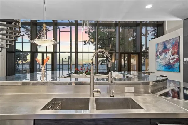 a living room with a bed furniture and a window