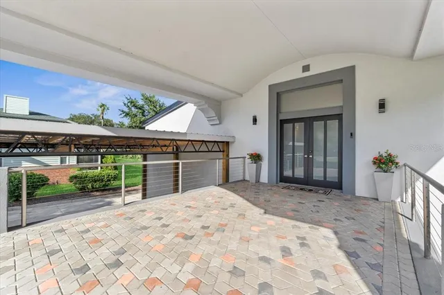 a view of livingroom with furniture wooden floor and windows