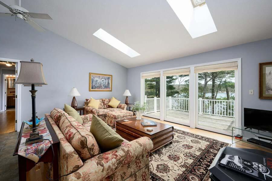 14 Arnold Road Forestdale, MA 02644 - Photo 12 of 43 a living room with furniture and a flat screen tv