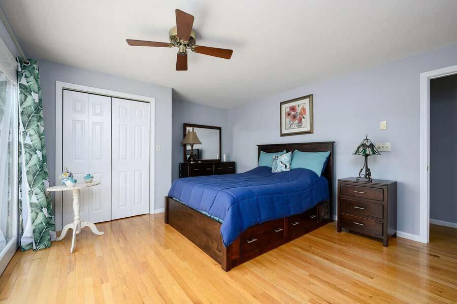 14 Arnold Road Forestdale, MA 02644 - Photo 22 of 43 a spacious bedroom with a bed and a table