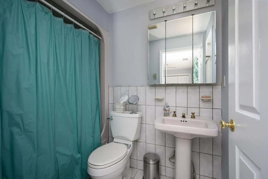 14 Arnold Road Forestdale, MA 02644 - Photo 29 of 43 a bathroom with a sink a toilet and shower