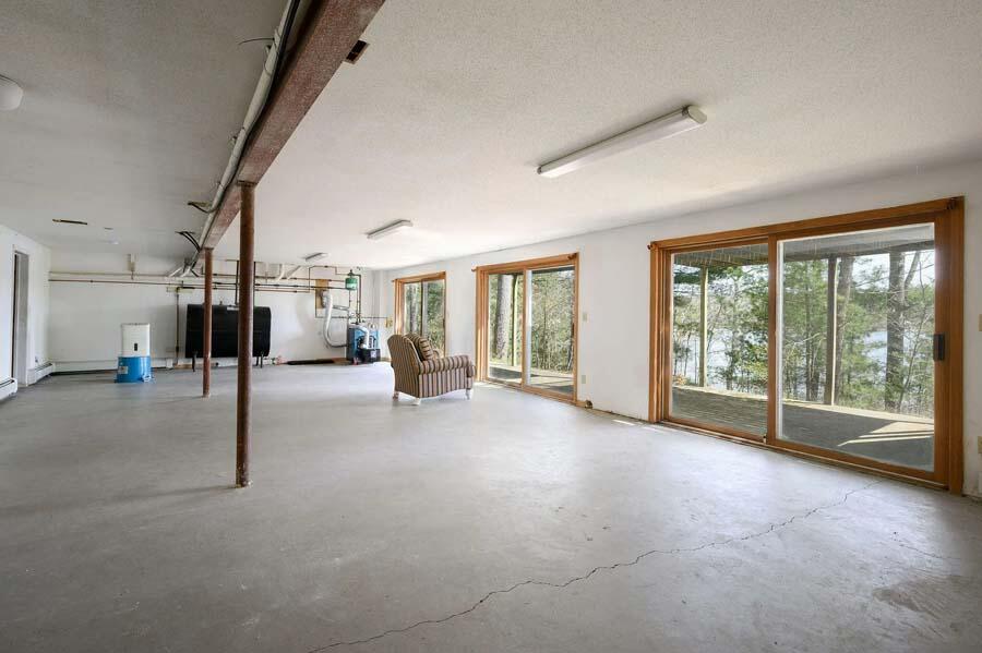 14 Arnold Road Forestdale, MA 02644 - Photo 30 of 43 a view of empty room with floor to ceiling windows