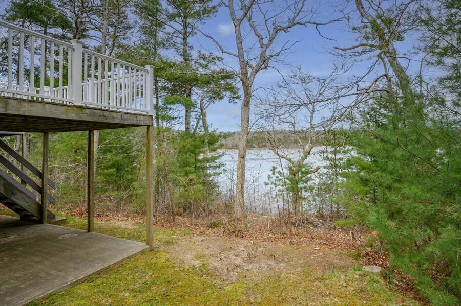 14 Arnold Road Forestdale, MA 02644 - Photo 40 of 43 a view of a yard with plants and large trees