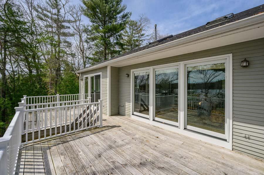 14 Arnold Road Forestdale, MA 02644 - Photo 43 of 43 a view of backyard with large trees and wooden floor