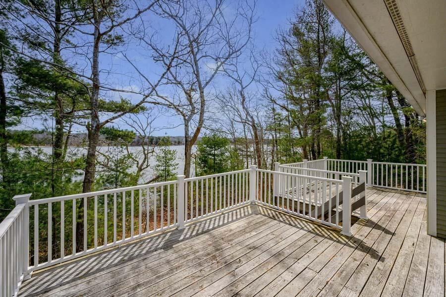 14 Arnold Road Forestdale, MA 02644 - Photo 5 of 43 a view of balcony with wooden floor and fence