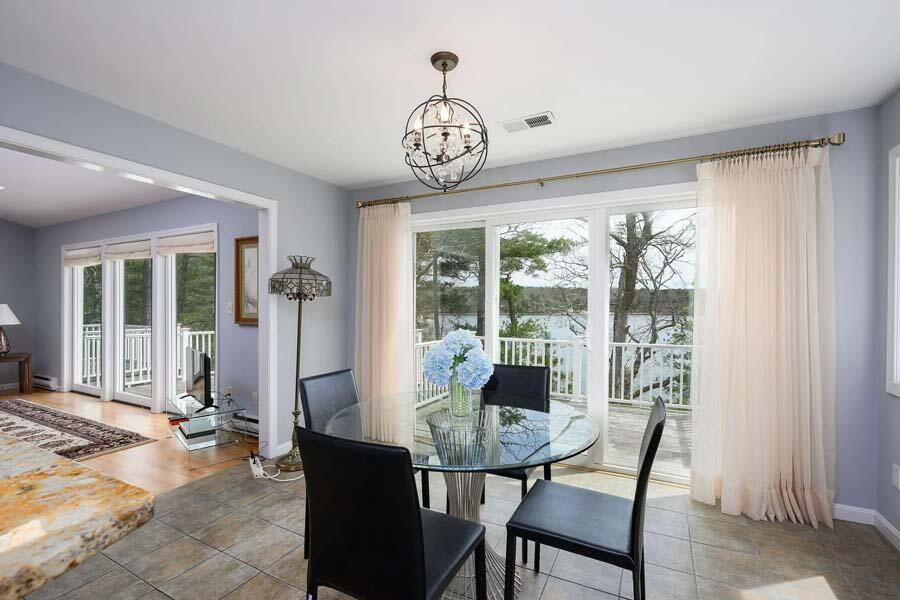 14 Arnold Road Forestdale, MA 02644 - Photo 9 of 43 a view of a dining room with furniture window and outside view