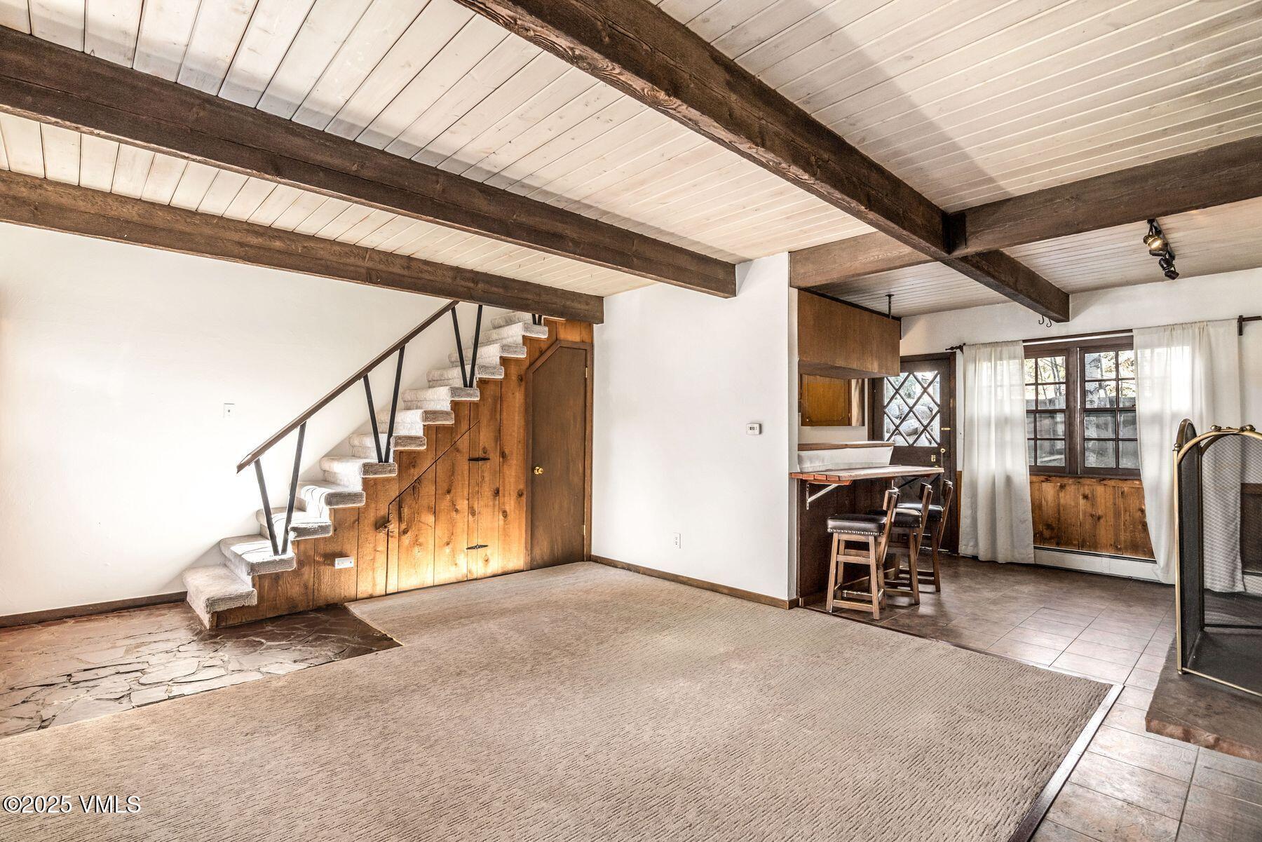 2450 Chamonix Lane, Unit A2 Vail, CO 81657 - Photo 18 of 32 Living/Dining/Stairs