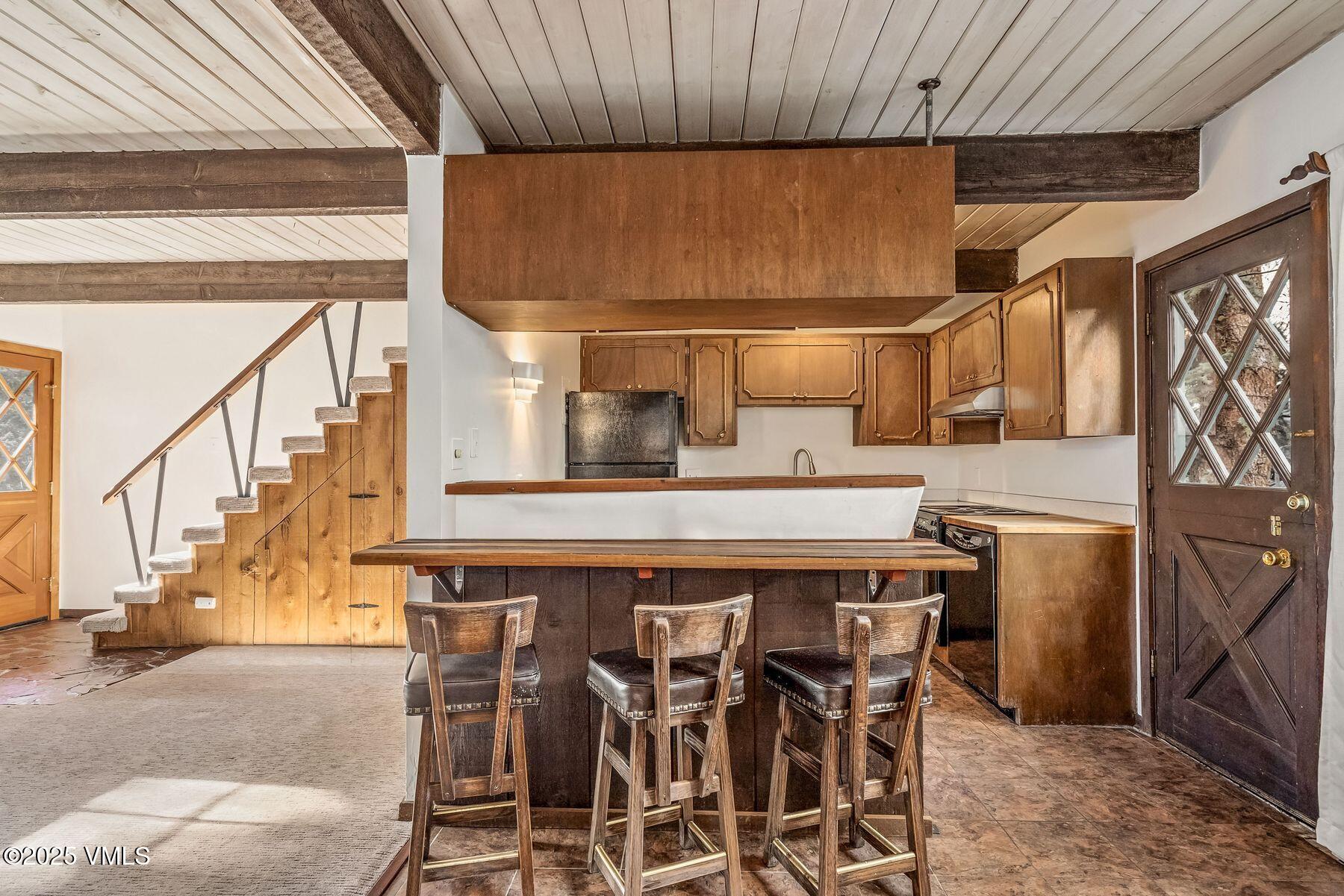 2450 Chamonix Lane, Unit A2 Vail, CO 81657 - Photo 19 of 32 Kitchen bar top/seating