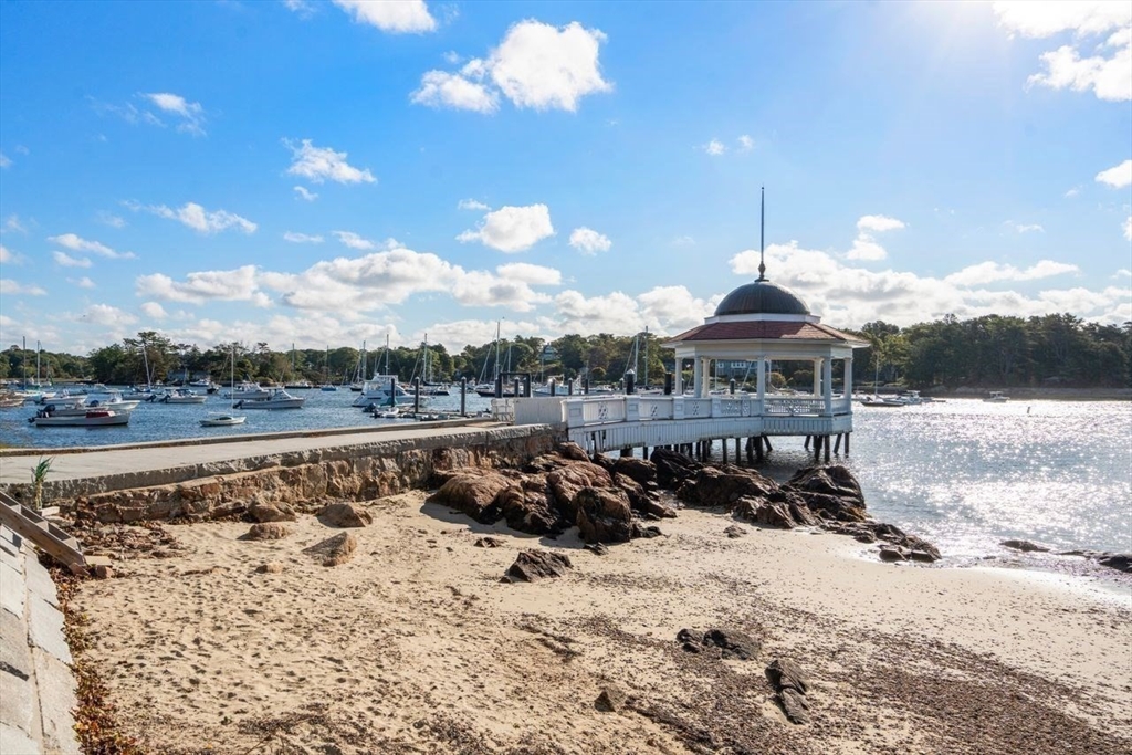 6 Highland Avenue Manchester, MA 01944 - Photo 14 of 17 a view of a lake with a house