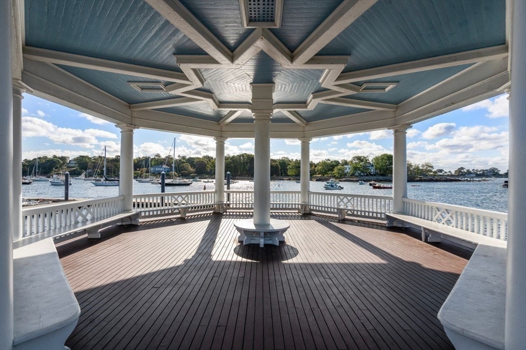 6 Highland Avenue Manchester, MA 01944 - Photo 15 of 17 a view of a swimming pool with a porch