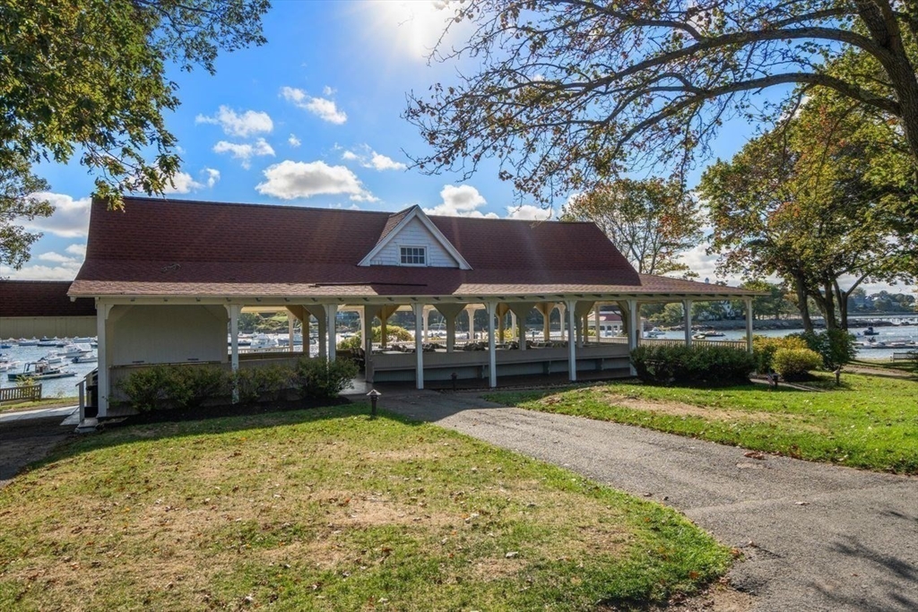 6 Highland Avenue Manchester, MA 01944 - Photo 17 of 17 a front view of a house with a yard