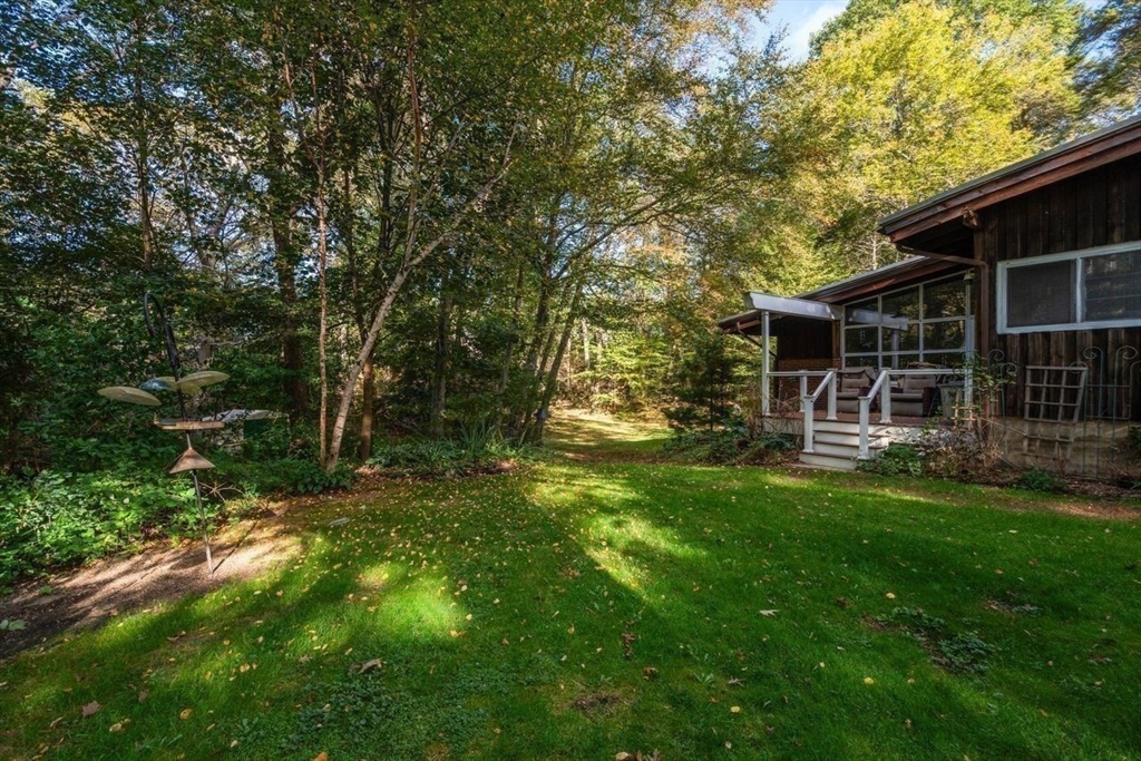 6 Highland Avenue Manchester, MA 01944 - Photo 4 of 17 a view of house with backyard space and balcony