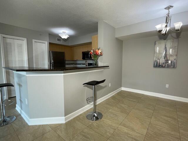 709 Villa Circle Boynton Beach, FL 33435 - Photo 12 of 43 Kitchen with Bar
