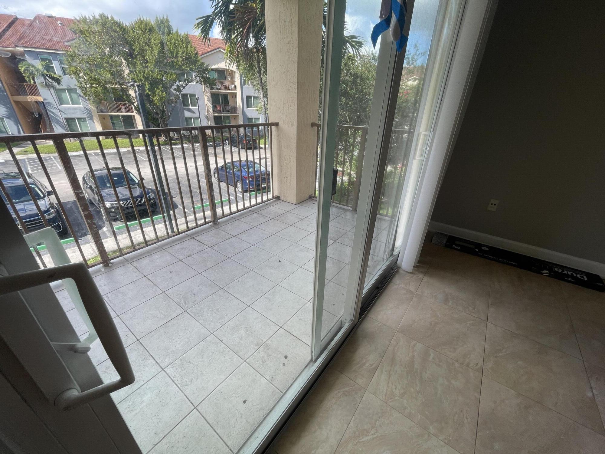 709 Villa Circle Boynton Beach, FL 33435 - Photo 18 of 43 COVERED BALCONY